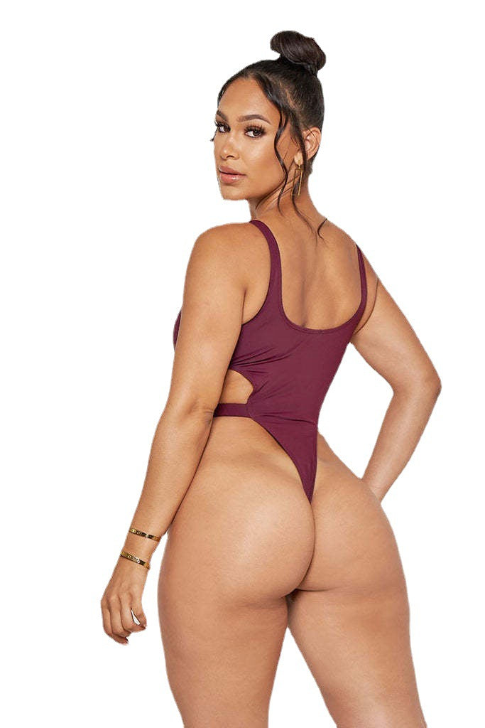 Dame en-delet badedragt med cut-out design og gyldne accenter Stilla