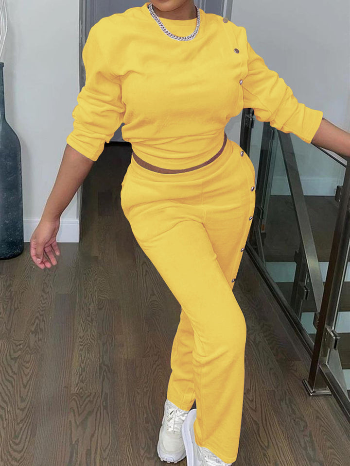 Dame Sporty fritidsoutfit med knapbart overdel og elastiske bukser Stilla
