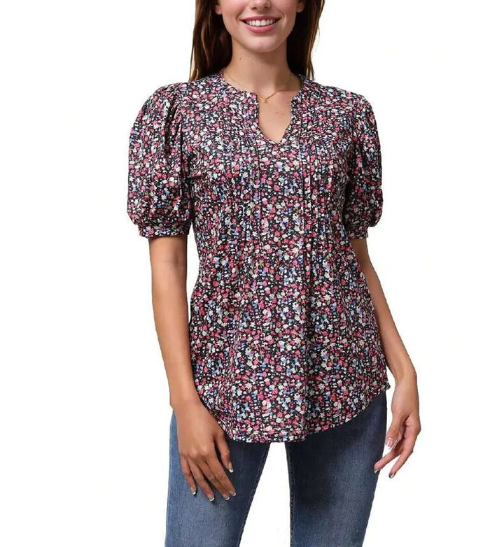 Damebluse med flæseærmer og blomsterdesign Stilla