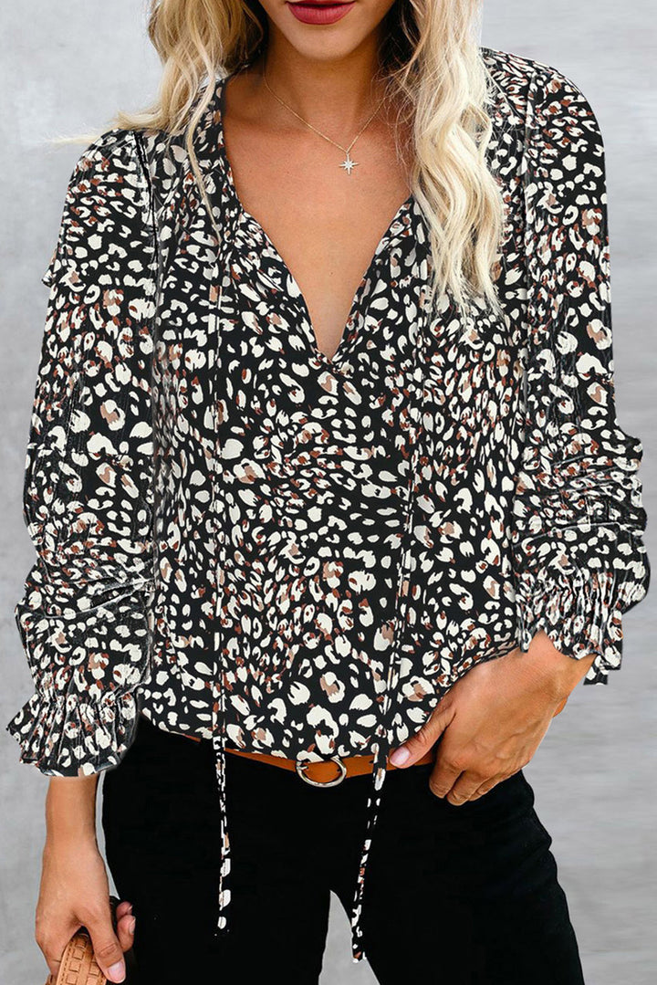 Damebluse med blomsterdesign og løse ærmer Stilla