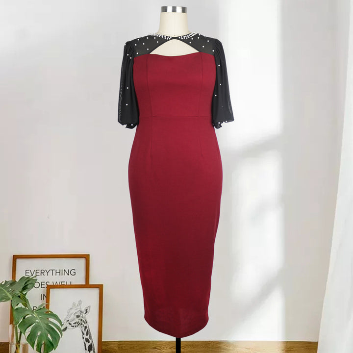 Damekjole med elegante gennemsigtige ærmer Skovae