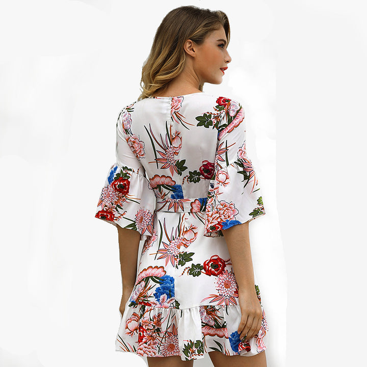 Dame omslagskjole med florale flæsedetaljer og elegant kant Stilla