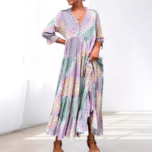 Dame maxidedragt med unikt patchwork-design og sidelommer Stilla