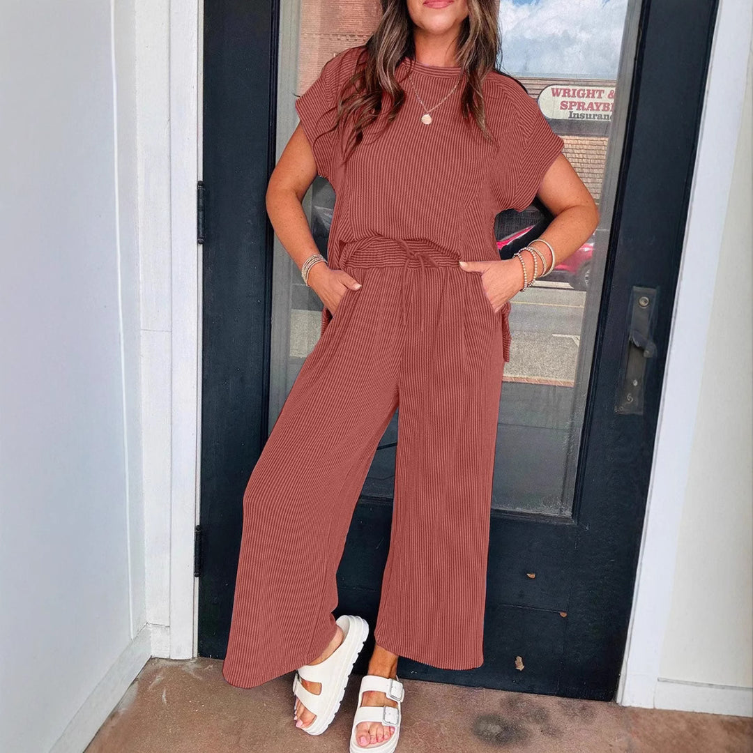 Dame afslappet strik-jumpsuit med brede ben og elastisk talje Stilla