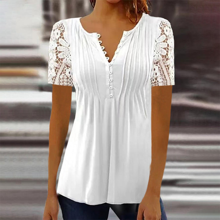 Damebluse med spidse ærmer og blomsterdesign Stilla
