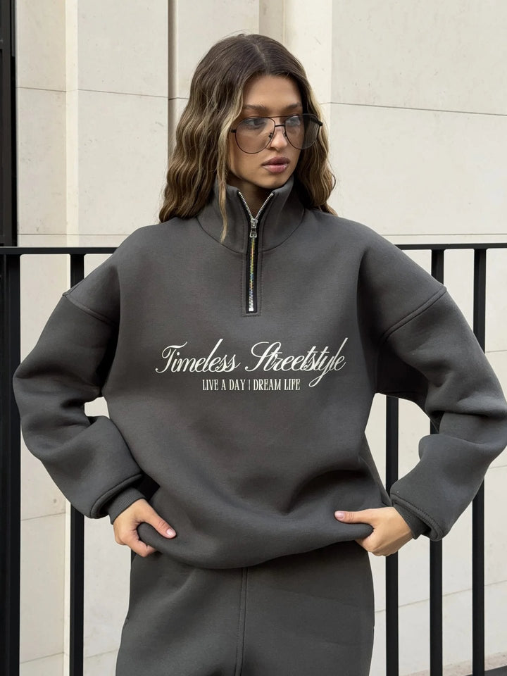 Kvindernes sporty halvlange pullover med fuldlængde lynlås og oversized pasform