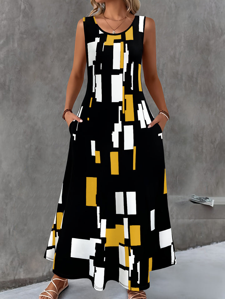 Dame Maxikjole med moderne geometrisk mønster og praktiske lommer Stilla