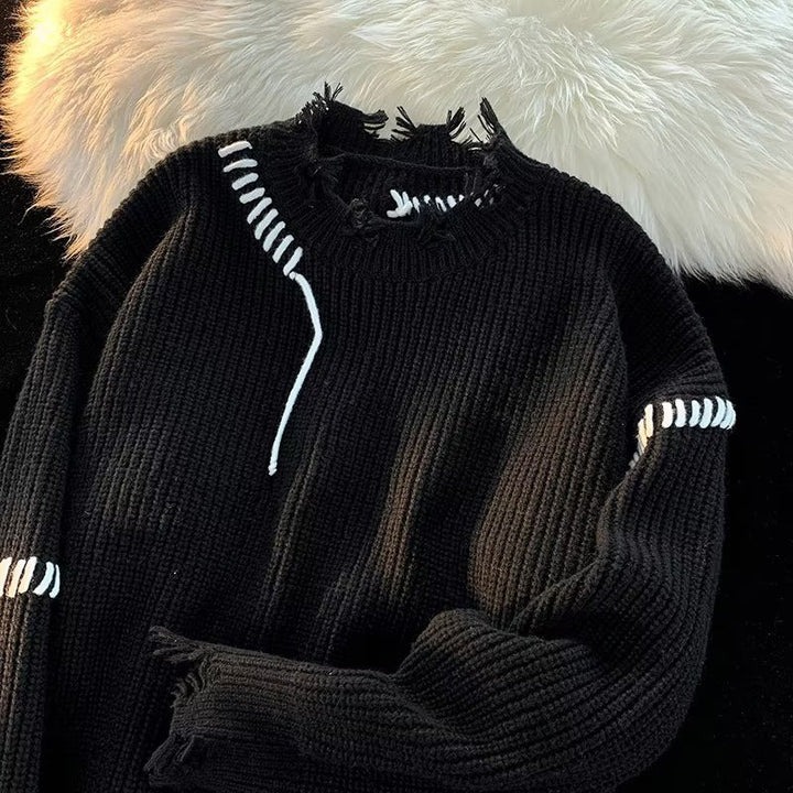 Dame Oversized Pullover med moderne frynser og unikke kontrastsyninger Stilla