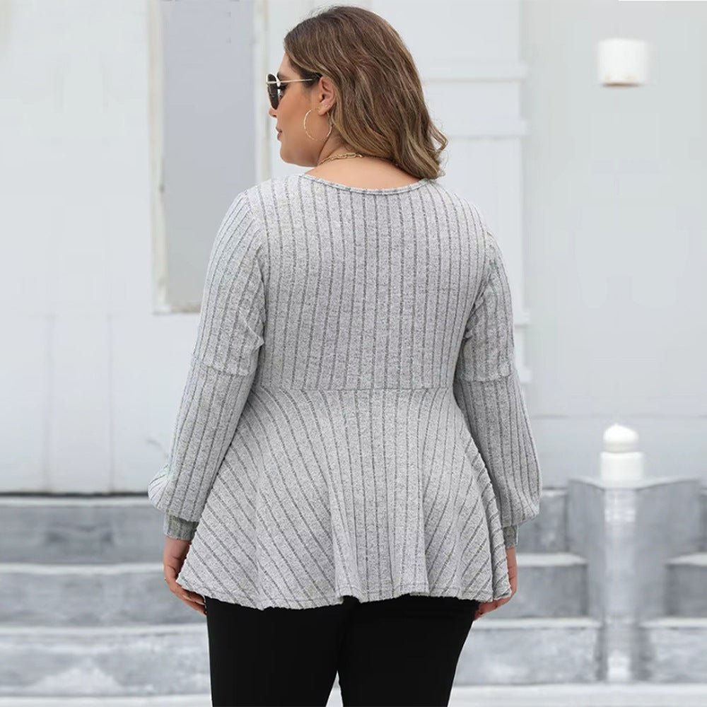 Dame elegant V-hals top med flydende snit og ribstruktur Stilla