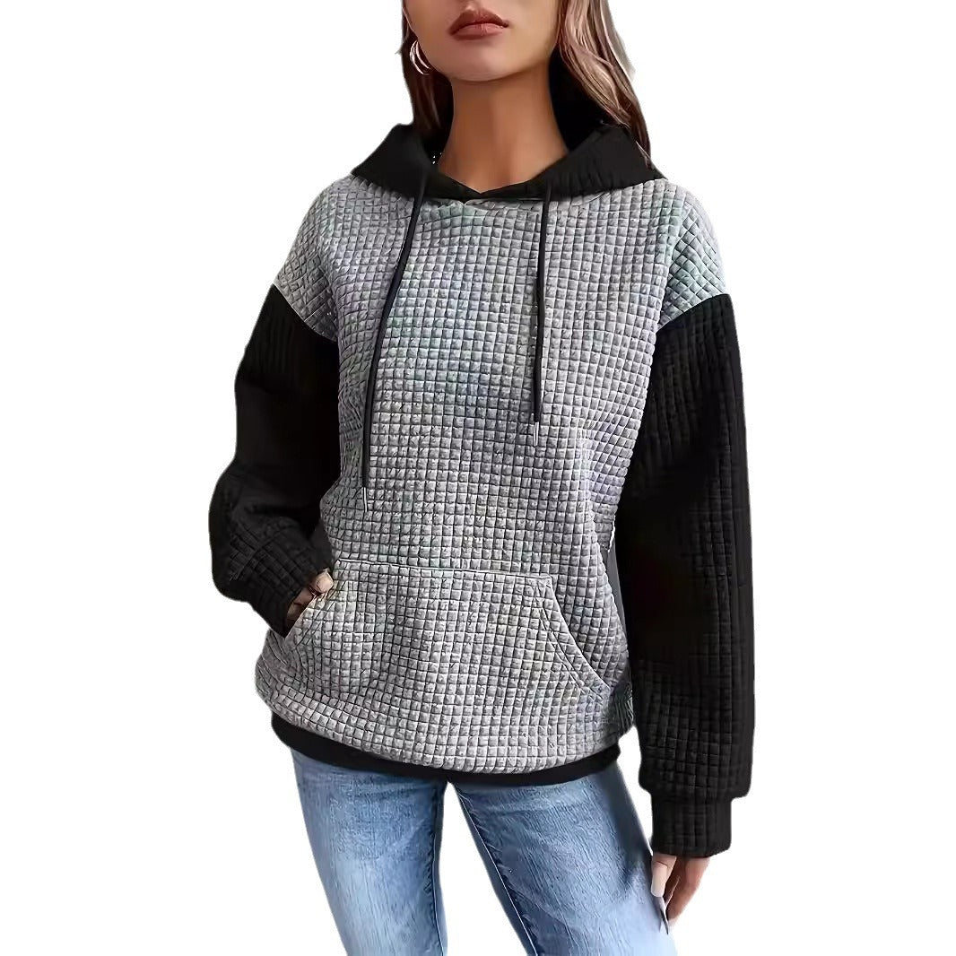 Dame hoodie med struktureret design og praktiske lommer Stilla