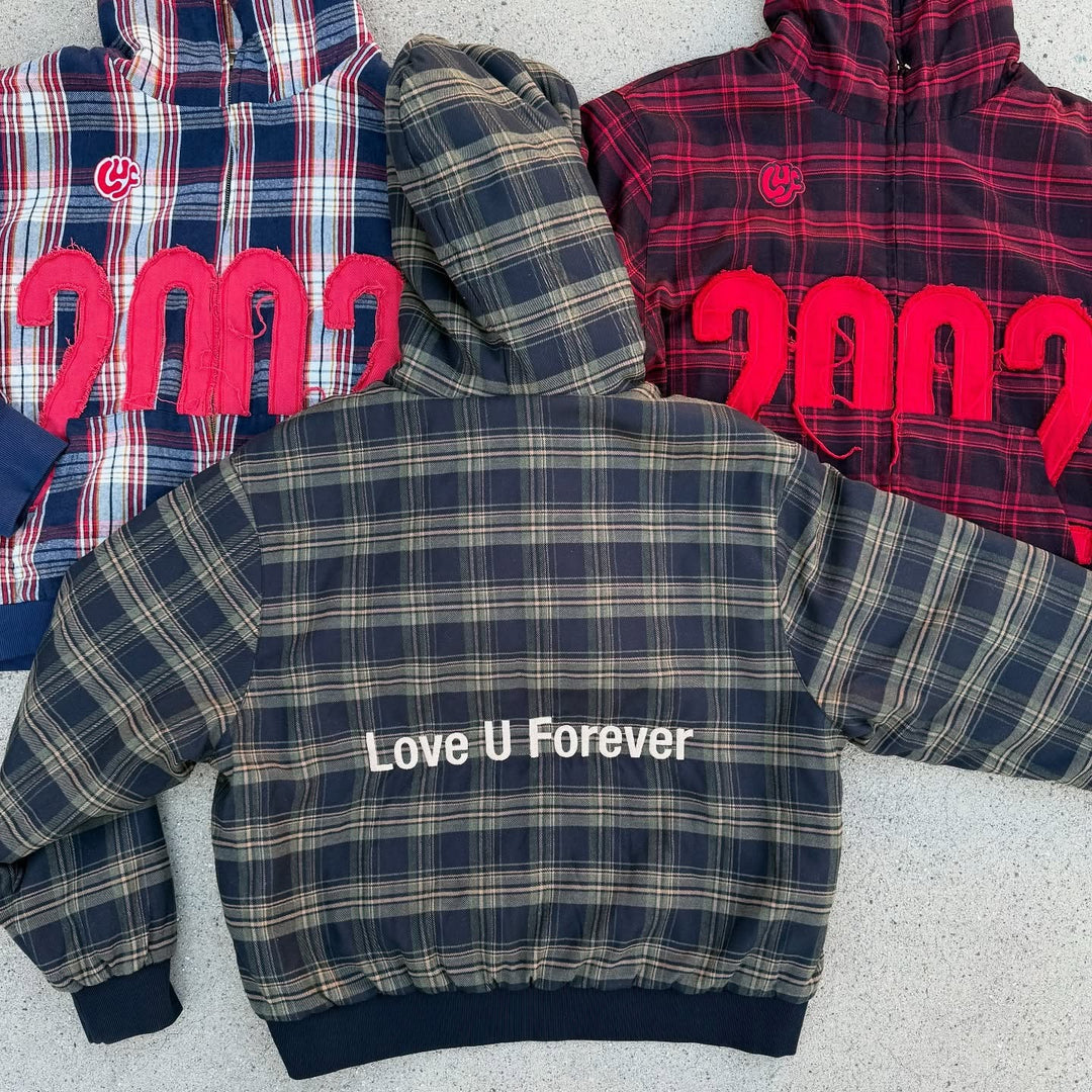 Kvinders afslappede hoodie bluse med ternet mønster og voluminøse ærmer Stilla