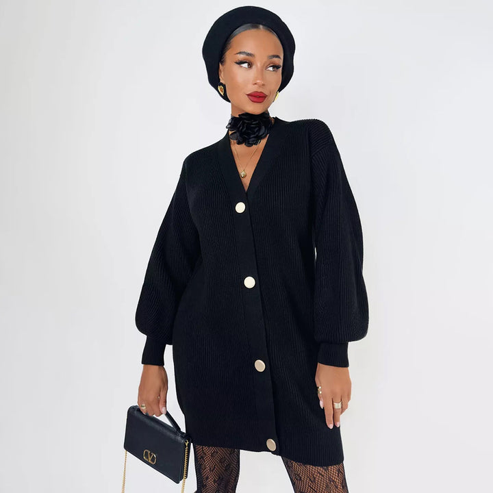 Kvinders strikket frakke med oversized snit og elegante knapdetaljer Stilla