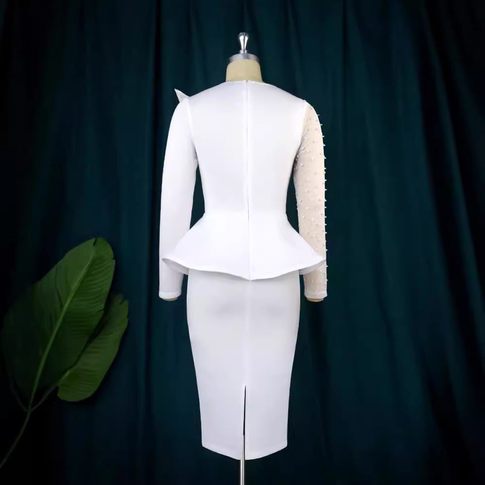 Dame Etuikjole med transparente puffærmer og dekorativt peplum Skovae