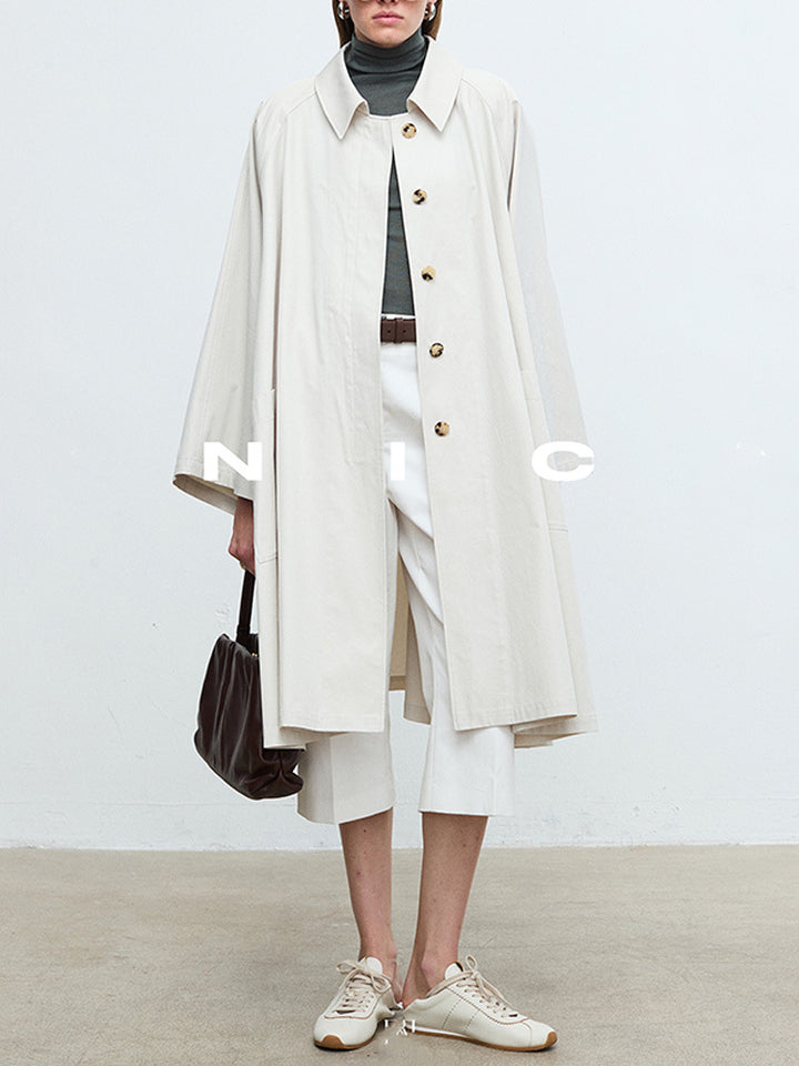 Kvinders afslappede trenchcoat med oversized ærmer og knapdetaljer Stilla