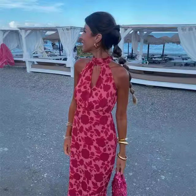 Dame maxikjole med floral trykdesign og elegant split Stilla
