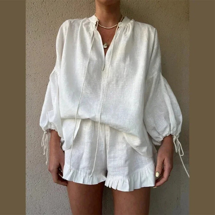 Damebluse med elegante sløjfebånd og voluminøse ærmer Stilla