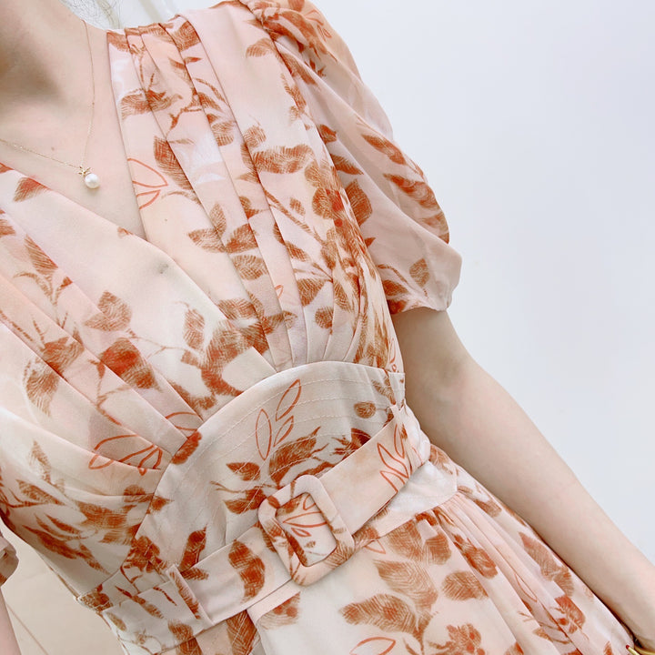Dame lang bluse i blomstret design med elastisk talje og puffærmer Stilla