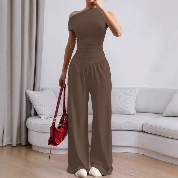 Stilig kvinders jumpsuit med asymmetrisk design og lommer Stilla