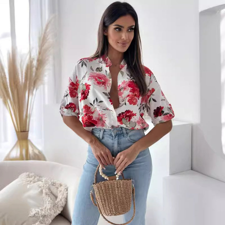 Damebluse med blomstermønster og dropped skuldre Stilla