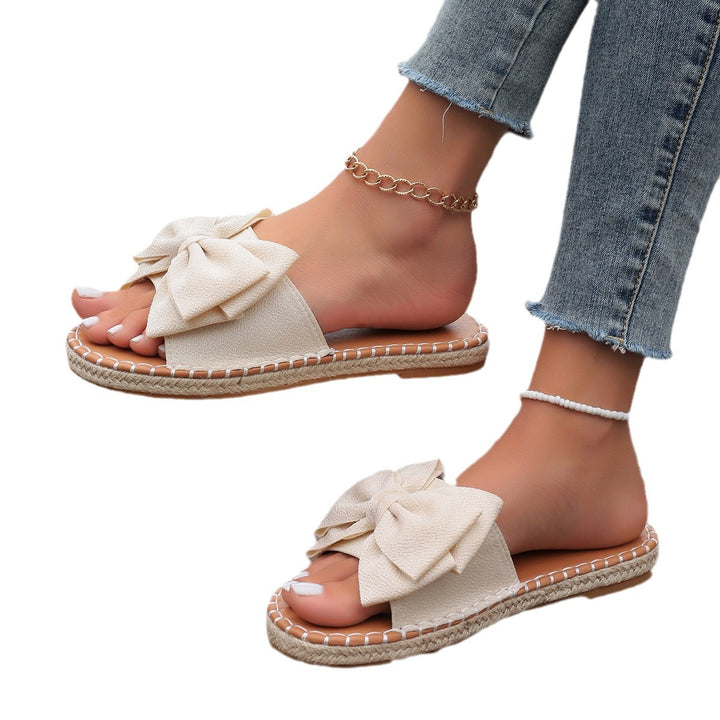 Dame slidesandaler med elegant sløjfe-look og blødt fodbeds Stilla