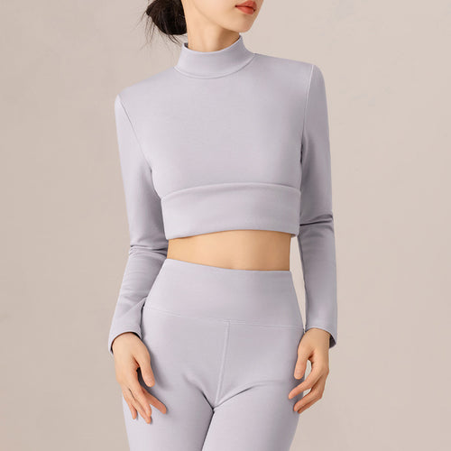 Dame sporttop med stilfuldt rullekrave og trendy cropped længde Stilla