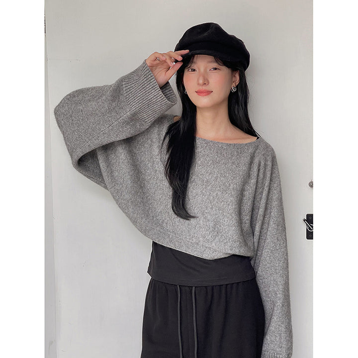 Dame afslappet sweater med brede ærmer og strikdetaljer Stilla