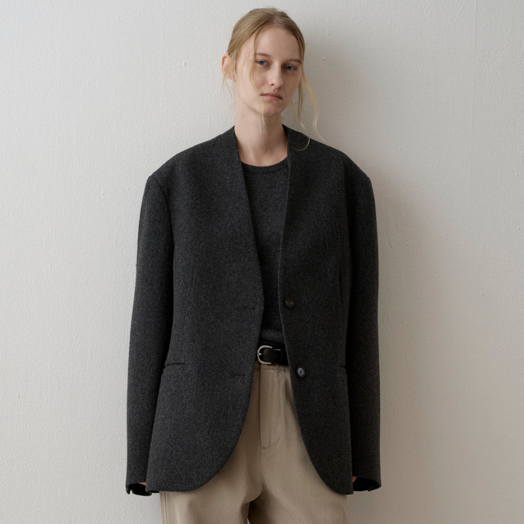 Kvinders elegante strikket blazer med asymmetrisk snit Stilla