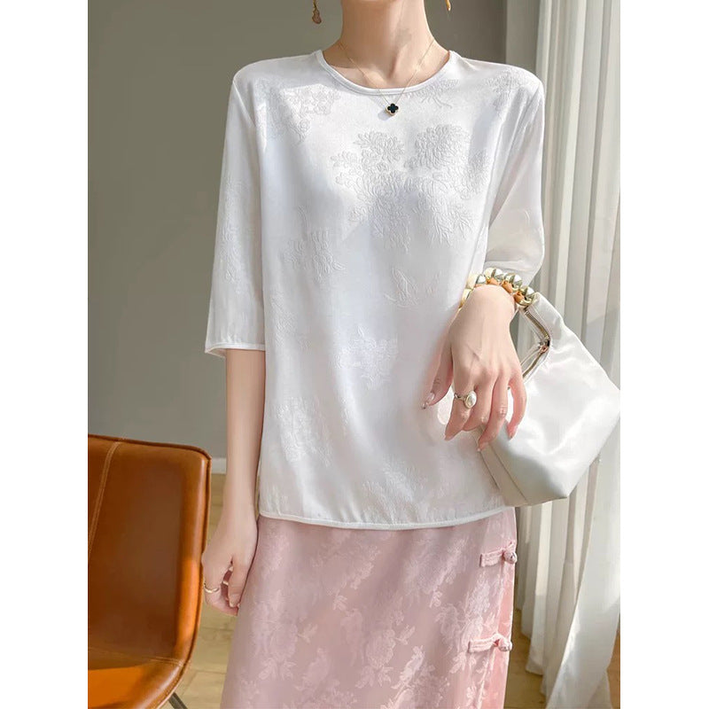 Damebluse med elegant broderi og fin struktur Stilla