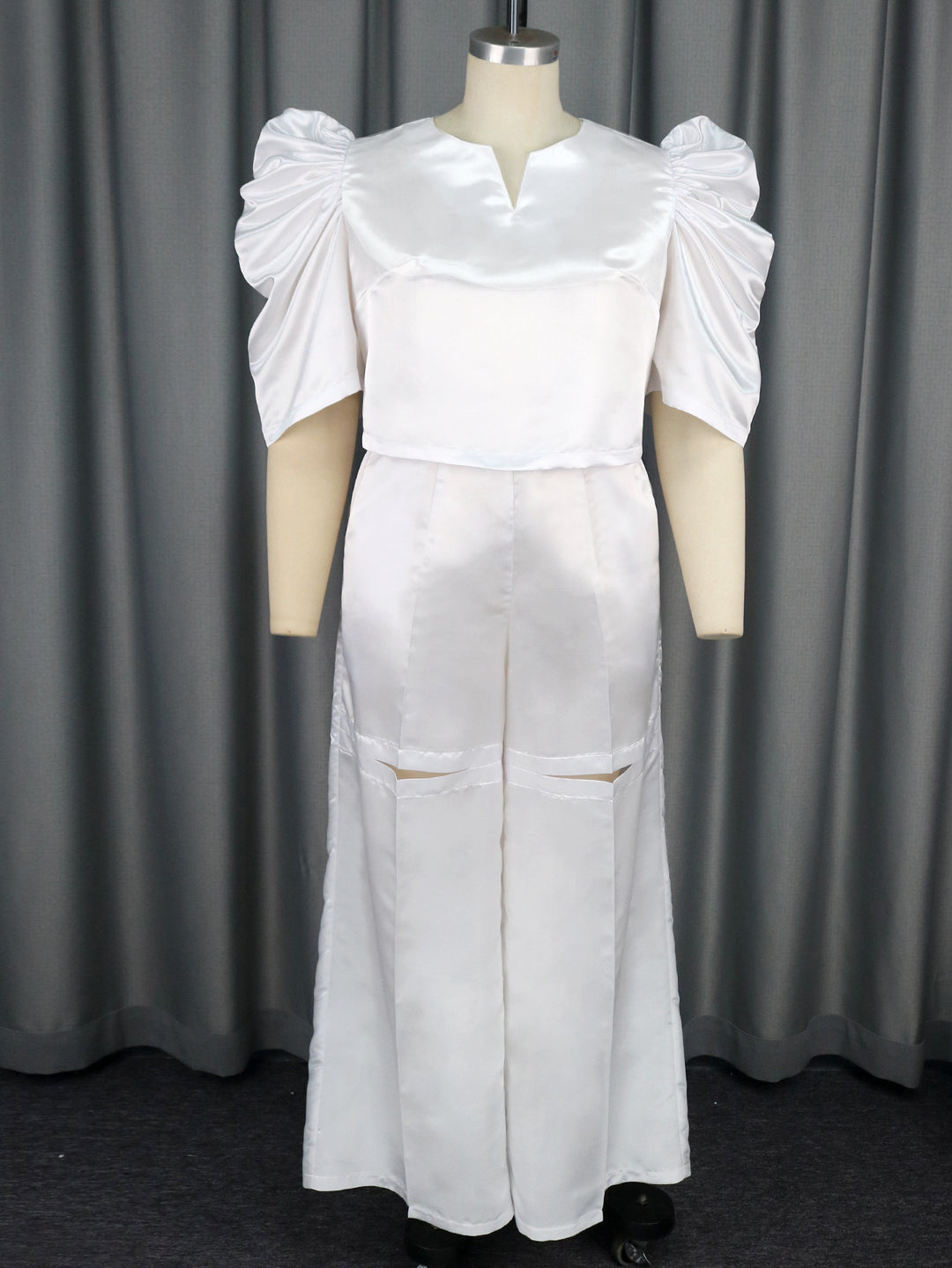 Damer Elegant jumpsuit med voluminøse puffærmer og smart talje detaljer Skovae