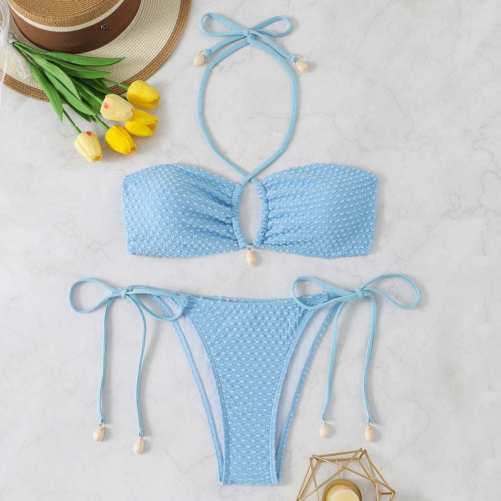 Dame bikini-sæt med innovativt bindemønster og trendy cut-out skovae