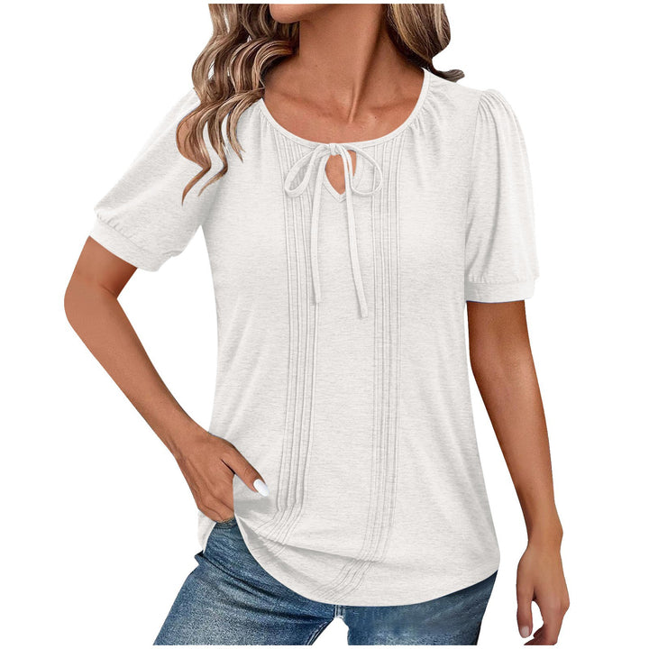 Damebluse med puffærmer og raffineret halterneck Stilla