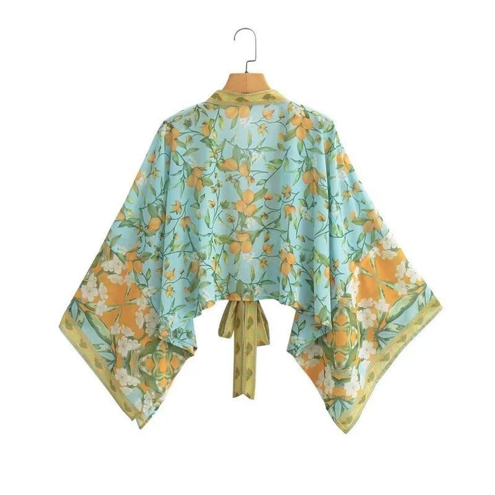 Dame kimono-jakke med blomsterdesign og lette ærmer Stilla