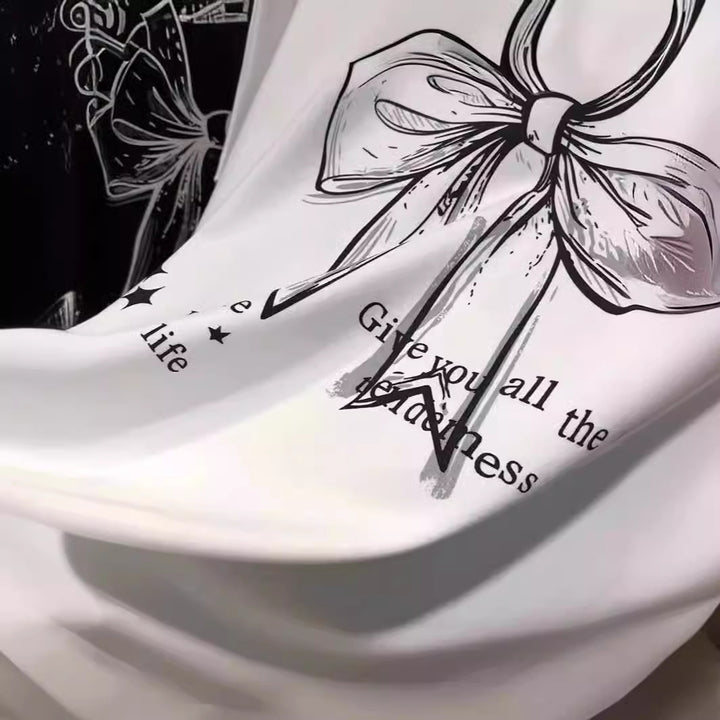 Dame T-shirt med legende båndmotiv og inspirerende slogan Stilla