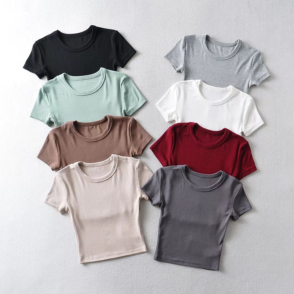 Damer cropped T-shirt med elastisk pasform og rund halsudskæring Stilla