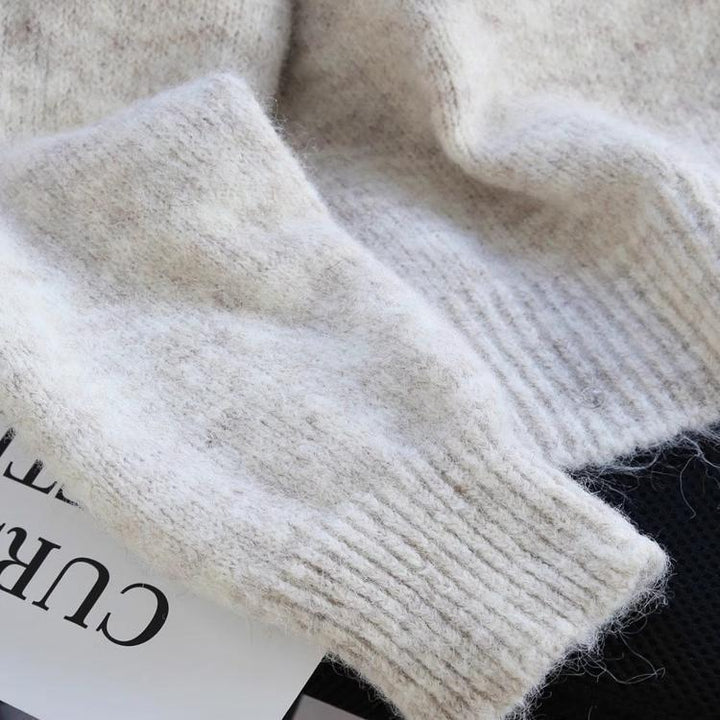 Kvinders hyggelige cardigan med hjerteknapdetaljer og bueaccent Stilla