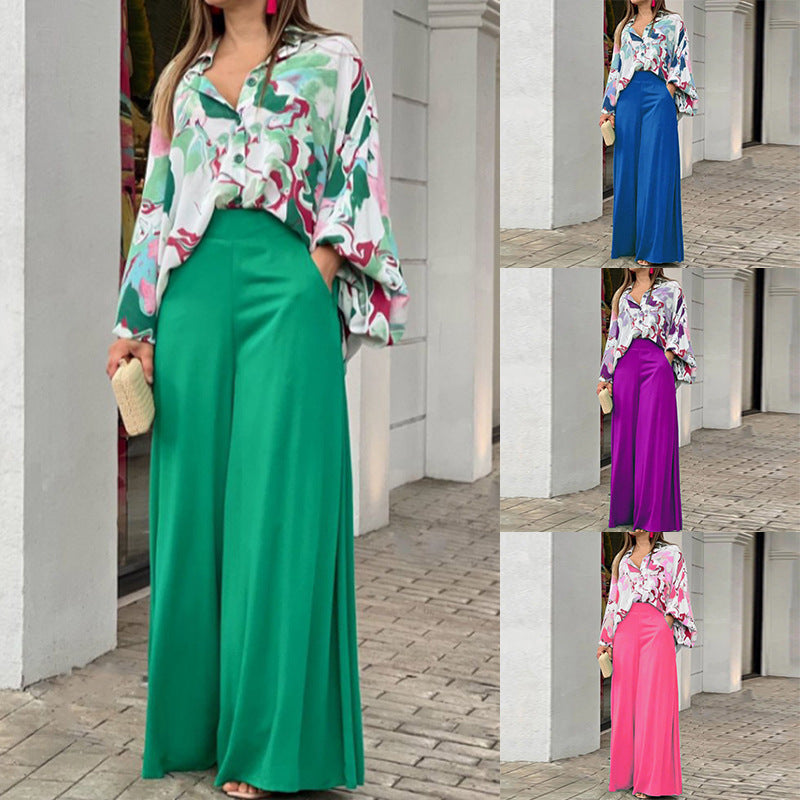 Dame fritidsbluse med farverig marmortryk og loose fit Stilla