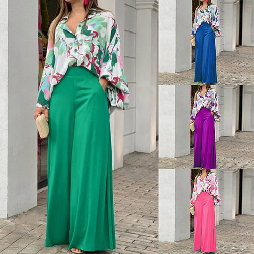 Dame fritidsbluse med farverig marmortryk og loose fit Stilla