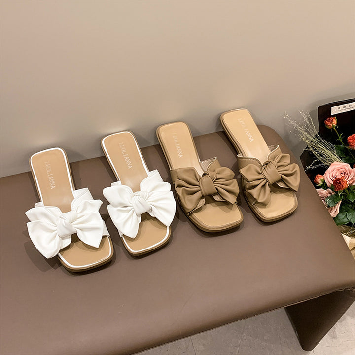 Dame mules med fashionable sløjfe-detalje og skridsikker sål Stilla