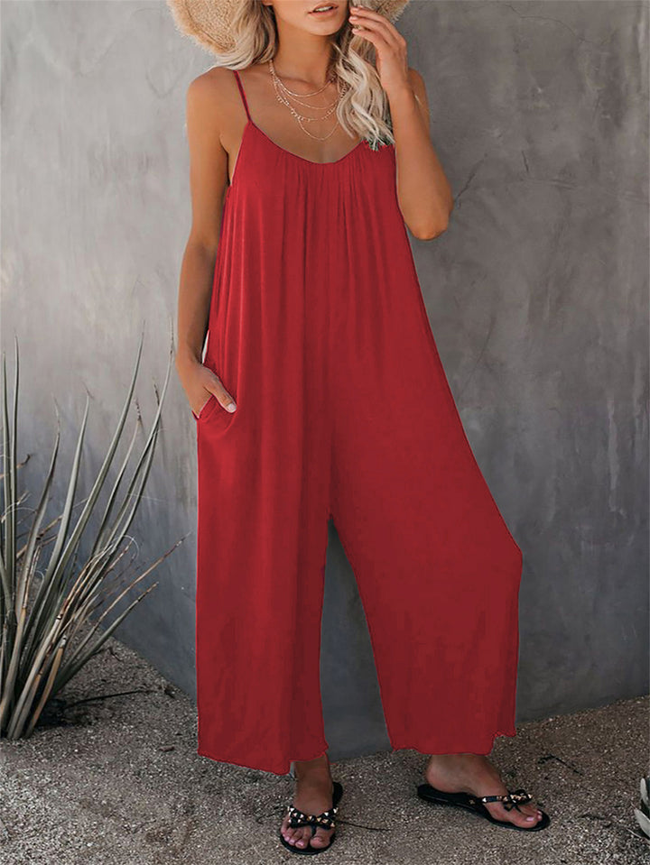 Dame afslappet maxi jumpsuit med justerbare spaghetti stropper og praktiske lommer Stilla
