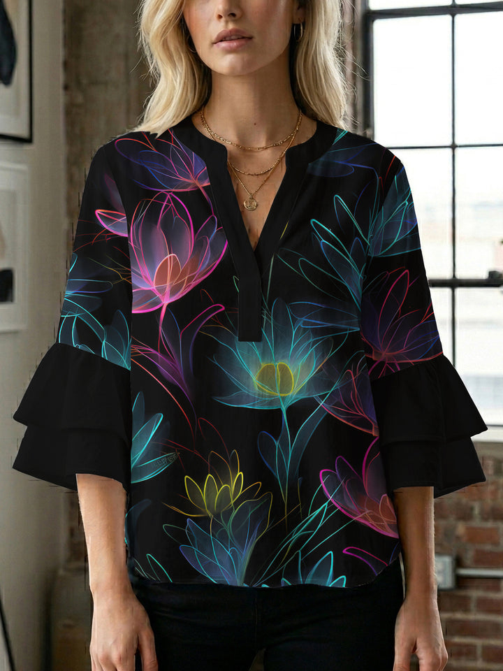 Damebluse med voluminøse flæseærmer og blomstermønster Skovae
