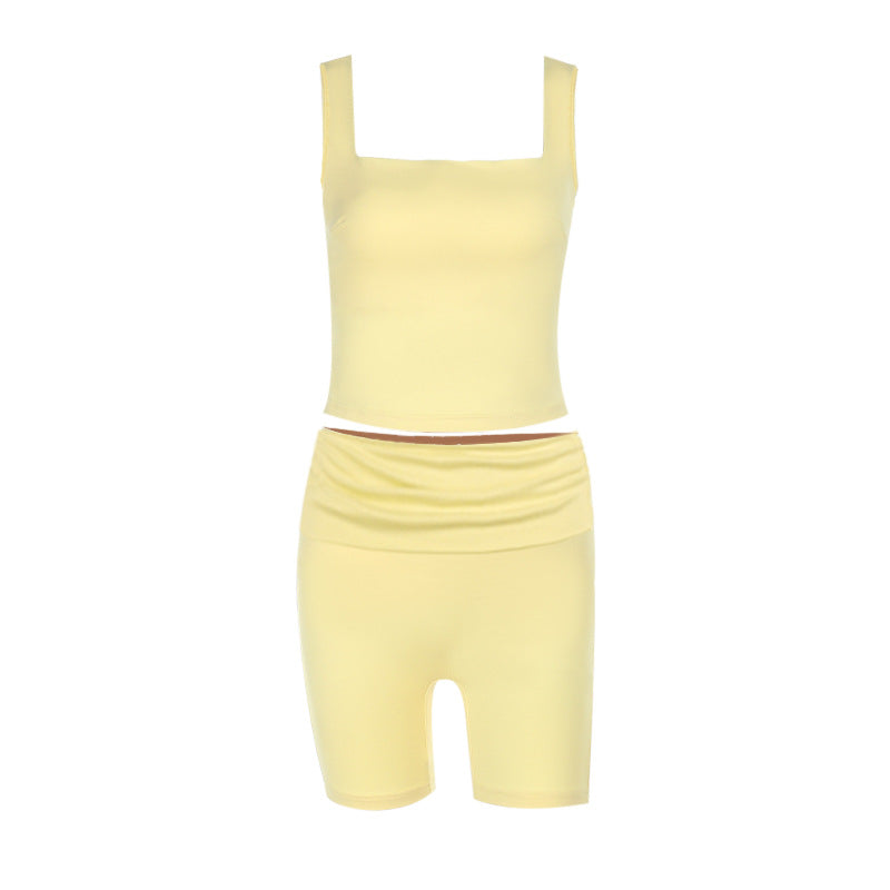 Dame sportsæt med figursyet top og shorts Skovae