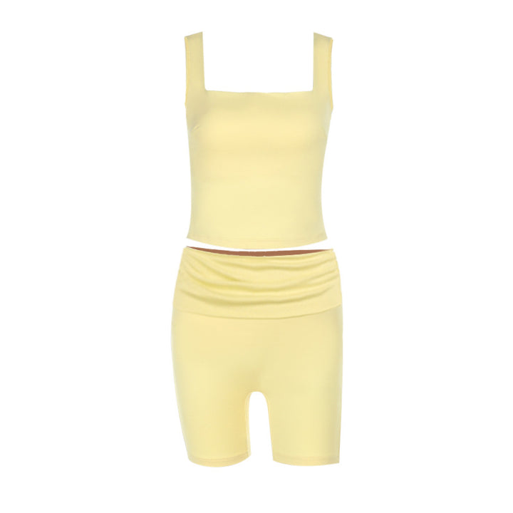 Dame sportsæt med figursyet top og shorts Skovae