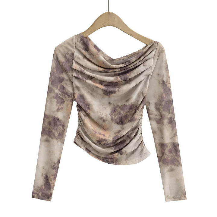 Kvindernes elegante langærmede top med samlet design Stilla