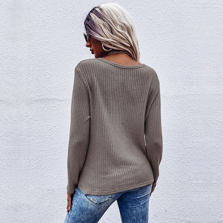 Damer afslappet V-hals pullover med knapdetaljer og knude design Stilla