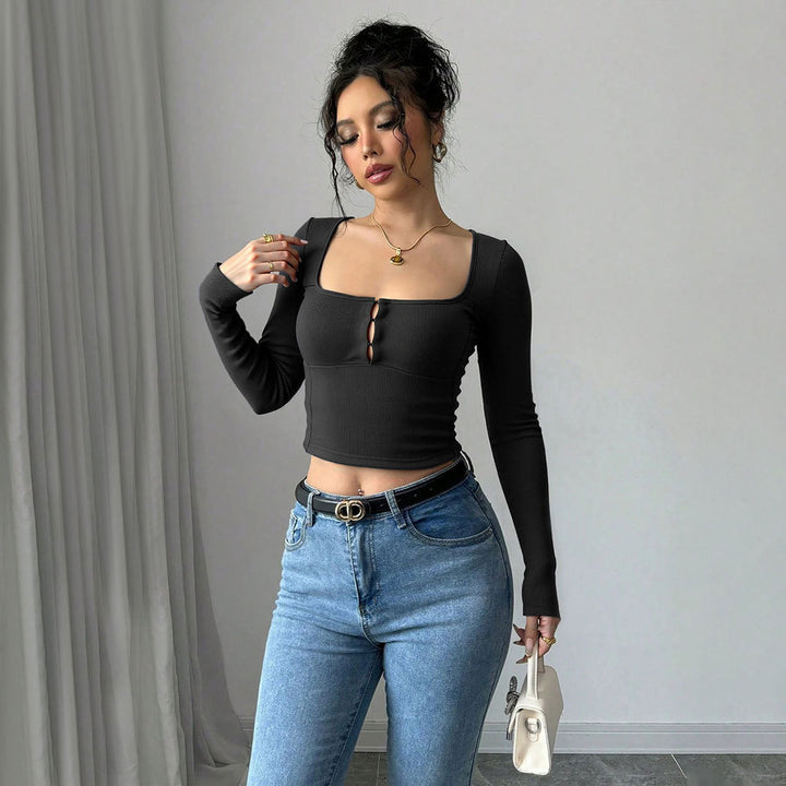 Kvindernes langærmede crop top med elegant knapdekoreret front Stilla