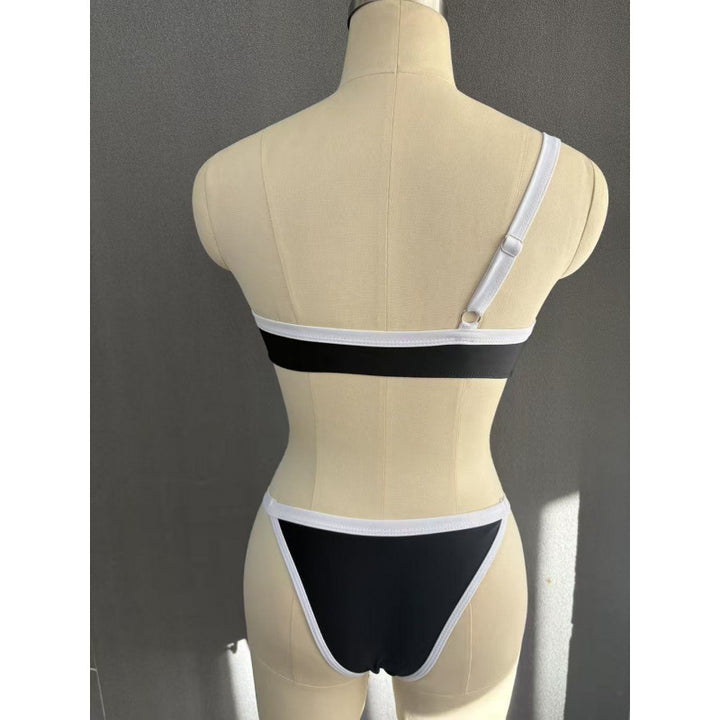 Damer Ensidet bikini med moderne kontrast og sporty design Skovae