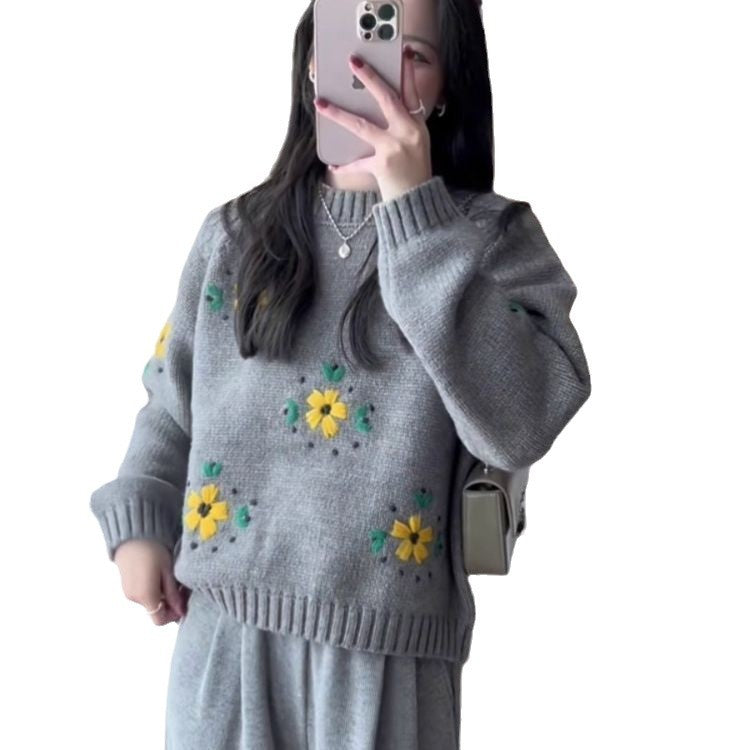 Kvinders strikket sweater med blomsterapplikationer Stilla