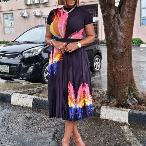 Dame Midi-kjole med elegant sommerfugl-tryk og plisseret skirt Stilla