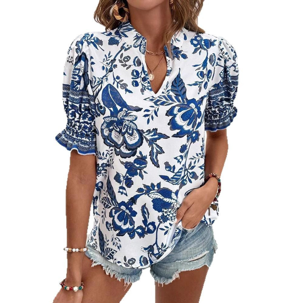 Damer Blusenshirt med florale puffærmer og moderne ståkrave Stilla