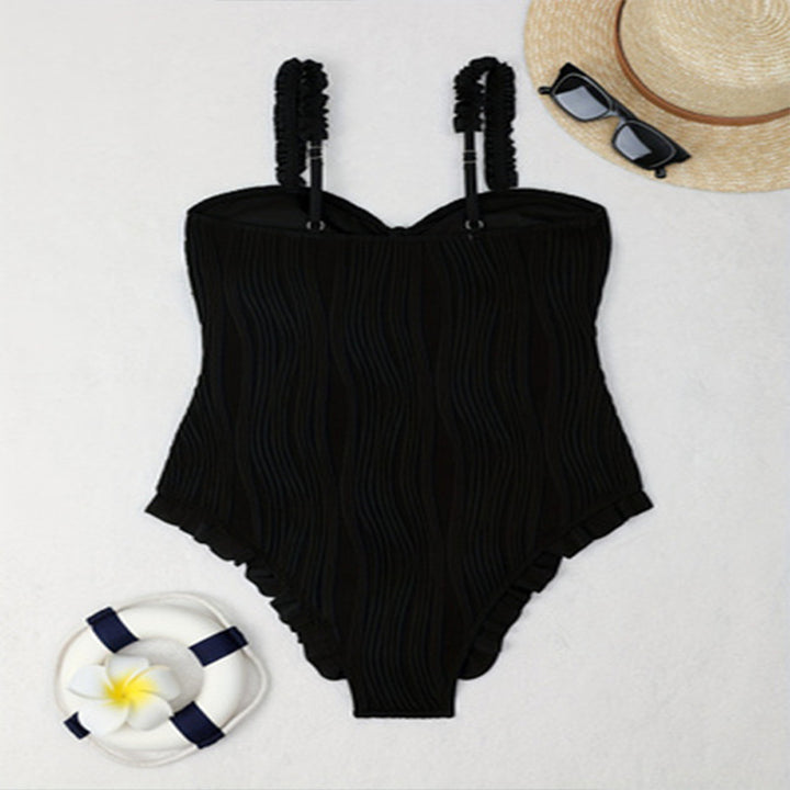 Dame en-delt badedragt med raffinerede ruffle detaljer Skovae